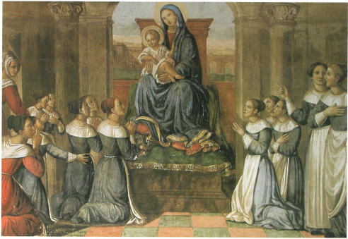 Le putte del Baraccano in preghiera davanti all'immagine della Madonna